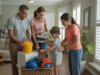 Hurricane Preparedness 2026 in Southwest Florida: Family checking emergency kit and evacuation plan ahead of the 2026 Atlantic hurricane season in Fort Myers and Naples