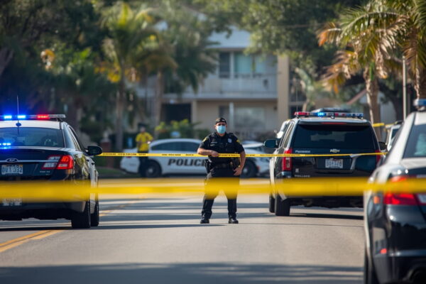 Police investigate shooting scene at Poinciana Apartments in Collier County, Southwest Florida, where one person was injured and the suspect remains at large on April 6, 2026