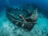 Diver exploring rare 300-year-old Spanish galleon wreck discovered off Sanibel Island in Southwest Florida Gulf of Mexico after powerful storm
