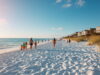 Families enjoying Easter Sunday celebrations on Fort Myers Beach with sunny skies and clear Gulf waters in Southwest Florida on April 5, 2026